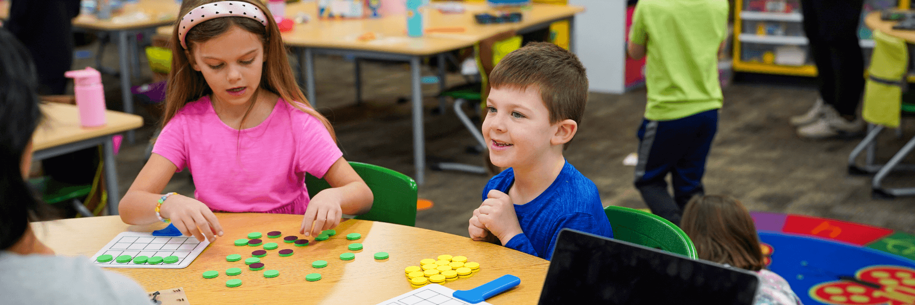 Group of Kindergartners sitting at a table.
